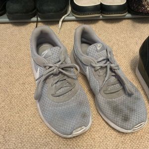 grey nike running shoes